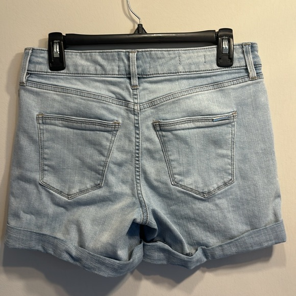 Mid-rise 5” distressed denim shorts. - Picture 4 of 7
